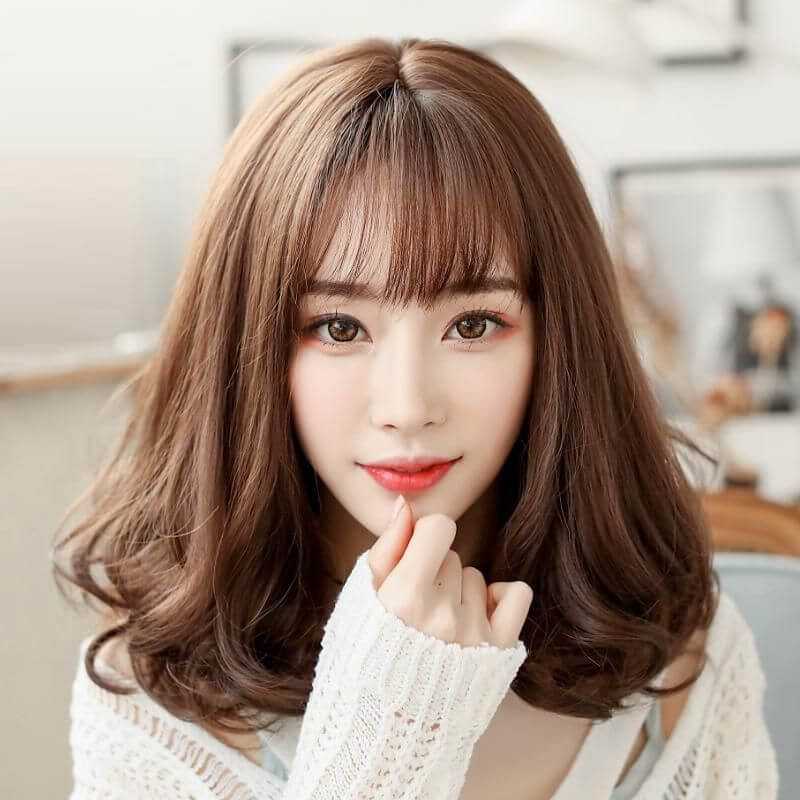 Mẫu tóc uốn đuôi bằng ngang gợi cảm
