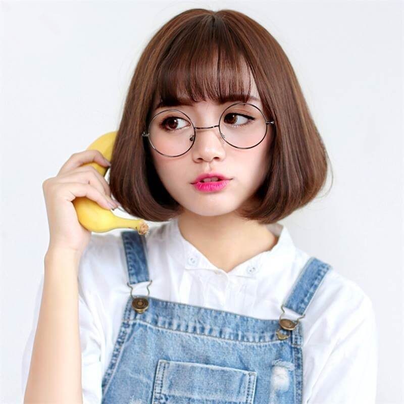 Tóc ngắn xoăn cụp ngang vai